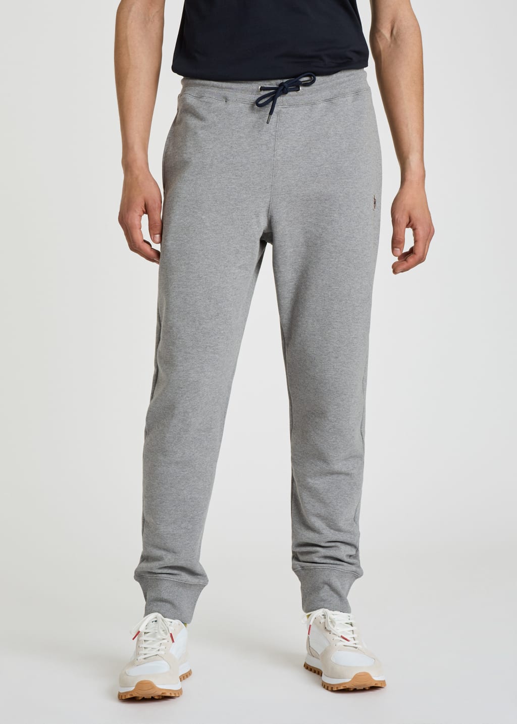 Man in grey sweatpants top