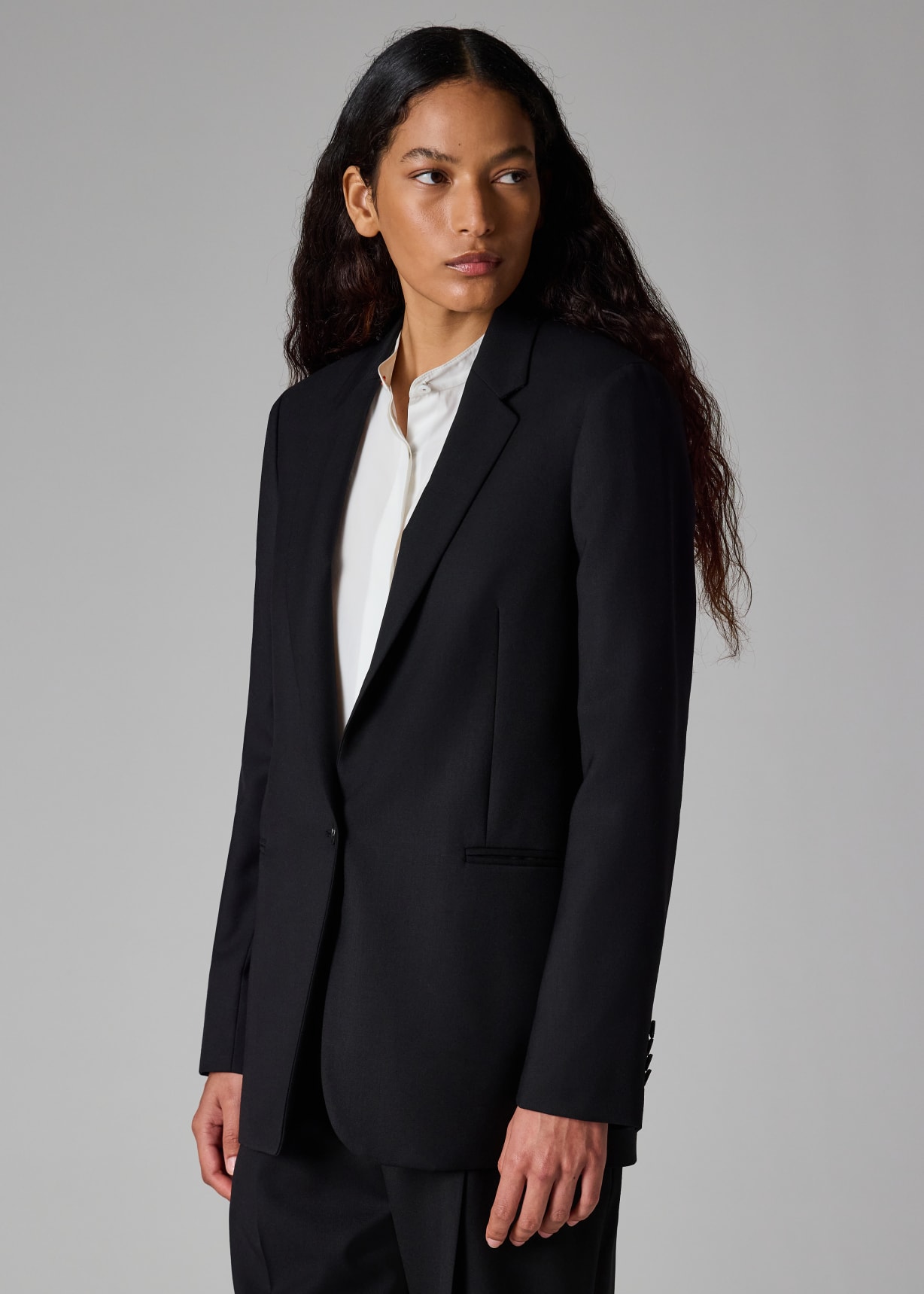 A Suit To Travel In Women's Black Wool Travel Blazer