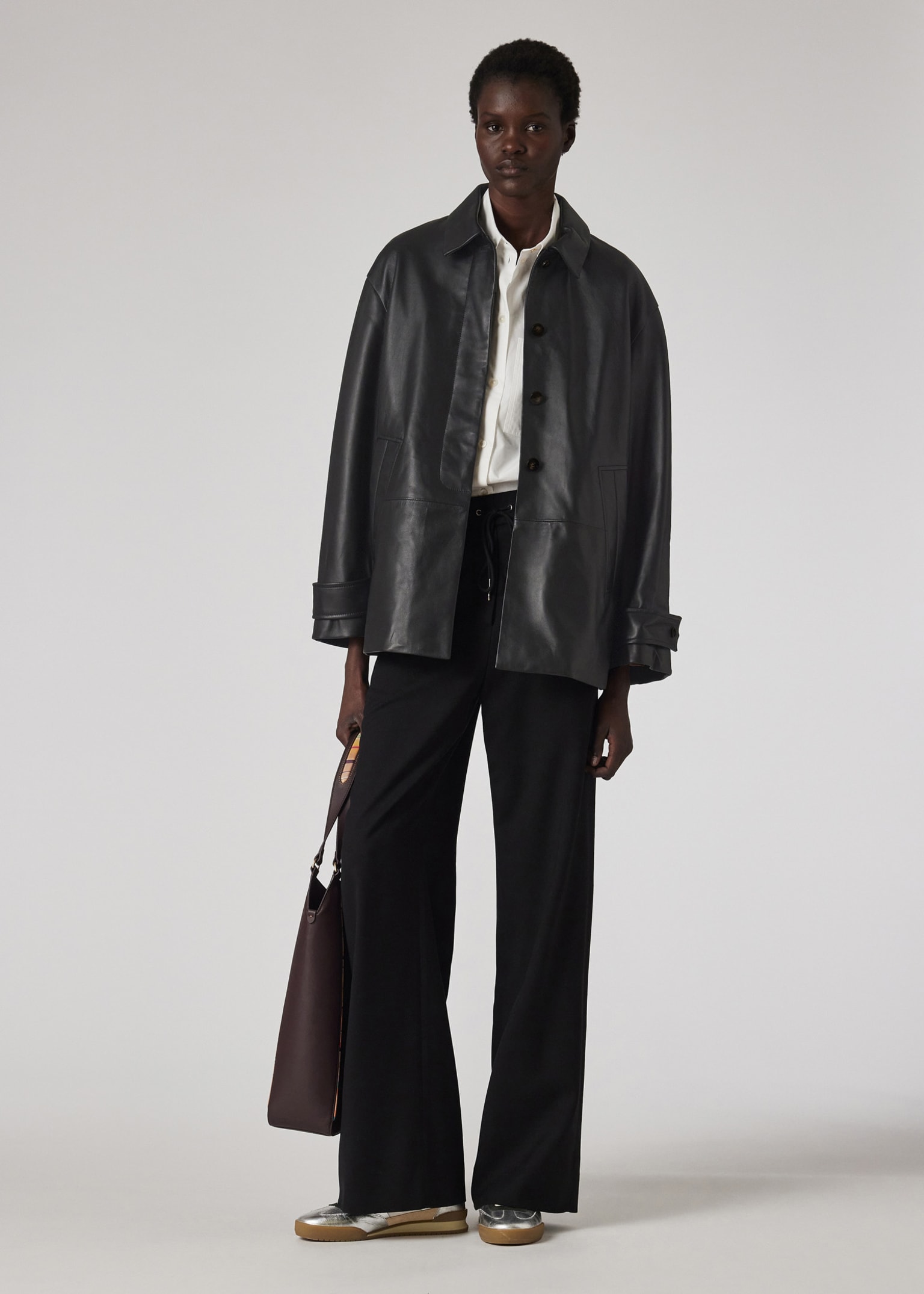 Women's Black Leather Swing Jacket With Button Back