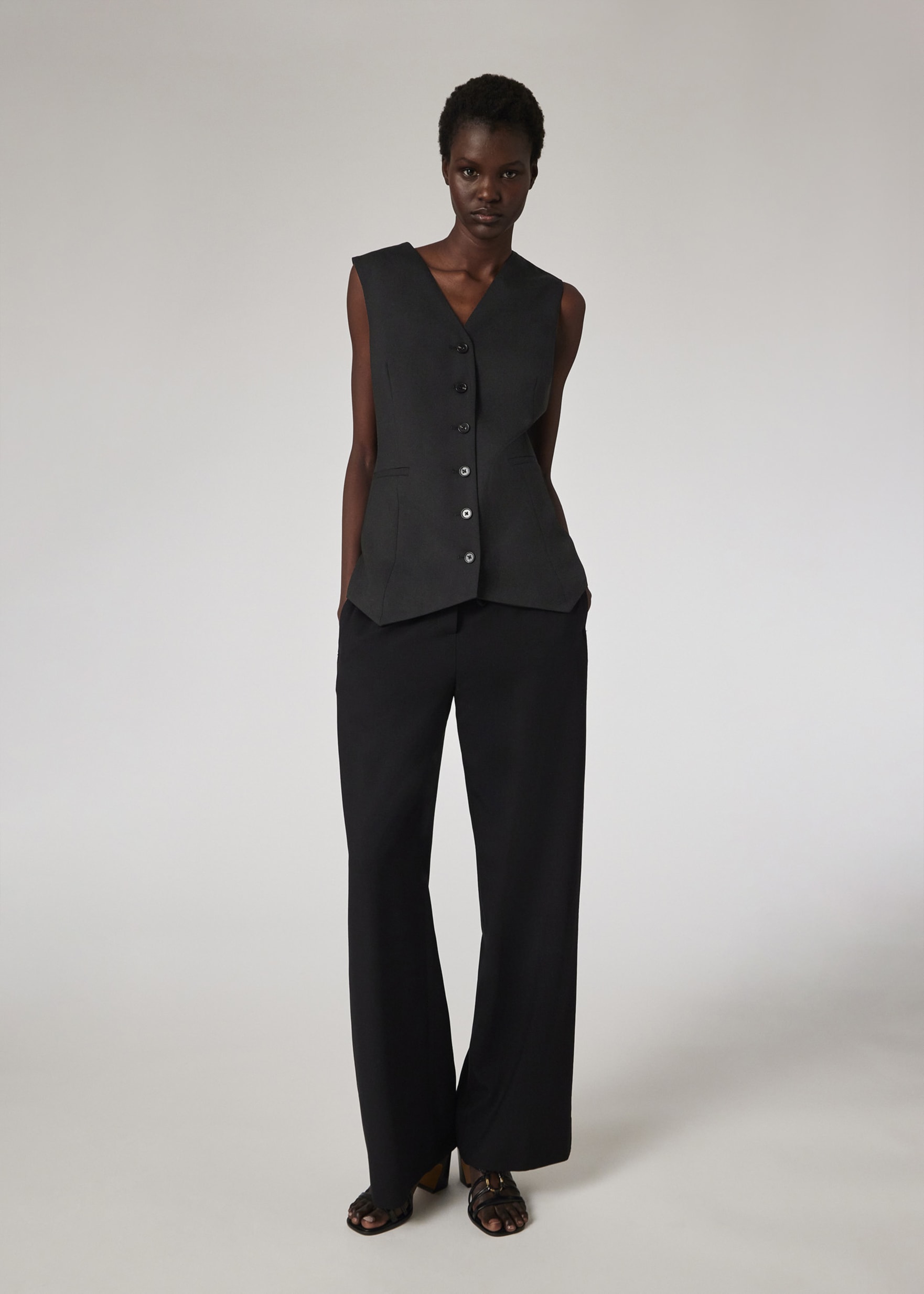 パンツ PAUL SMITH Woman Pants Black W1R347TP11074 79 Women's 'A Suit To Travel In' Black Wool Twill Pleated Trousers