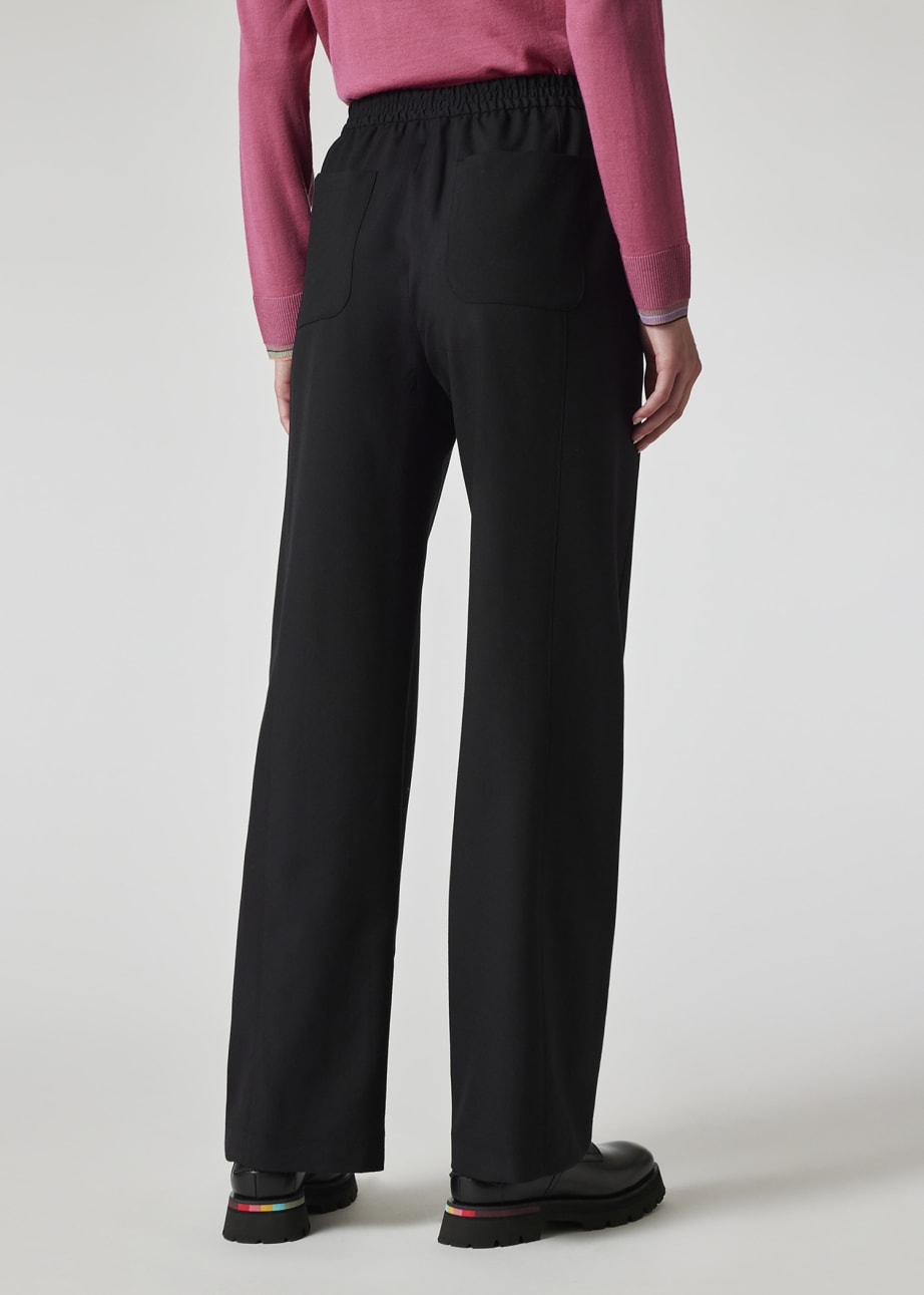 Model View - Women's Black Wool Wide-Leg Trousers by Paul Smith