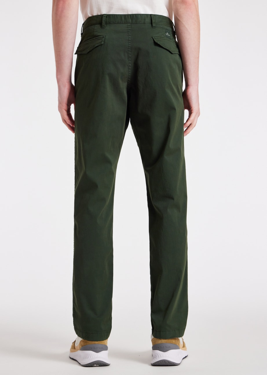 Model View - Tapered-Fit Dark Green Organic Cotton-Stretch Chinos Paul Smith