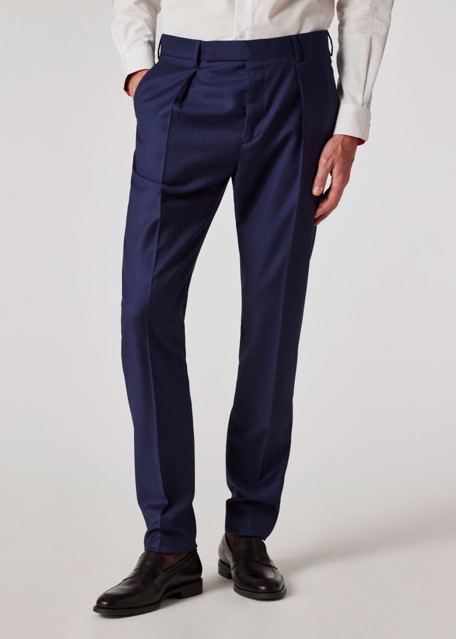 Model view - Tapered-Fit Navy Pinstripe Wool Pleated Trousers Paul Smith