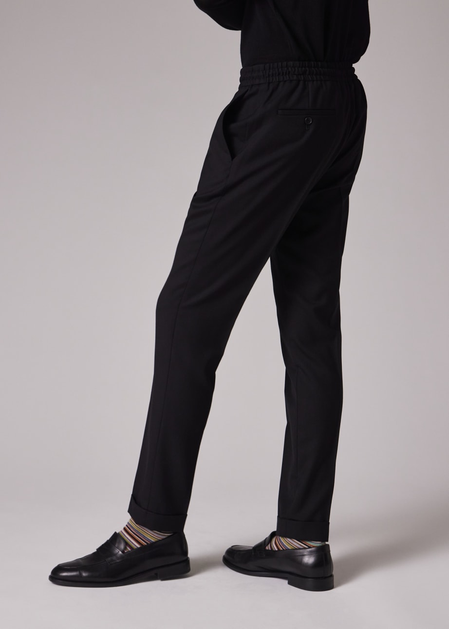 Model View - A Suit To Travel In - Men's Slim-Fit Black Drawstring-Waist Wool Trousers Paul Smith